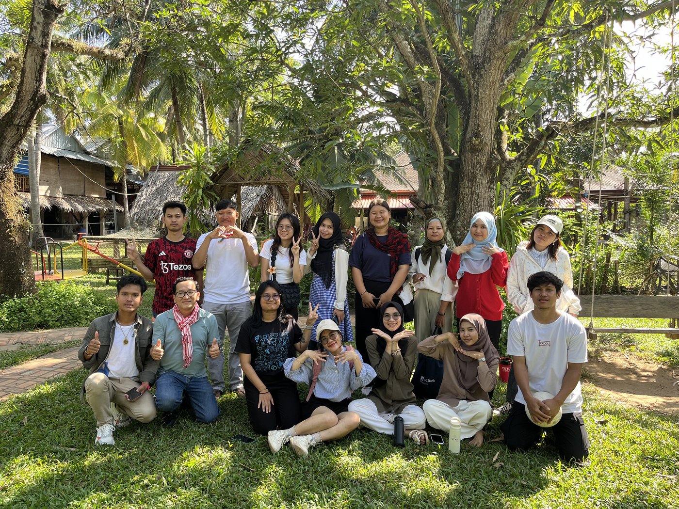 A group of NIPA members posing together outdoors at a network gathering